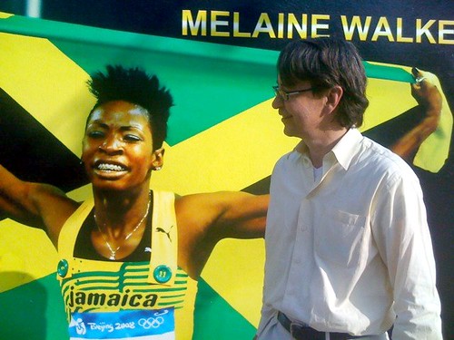 Hank Dittmar with mural of Olympic gold medalist Melanie Walker, Rose Town (courtesy of Hank Dittmar)