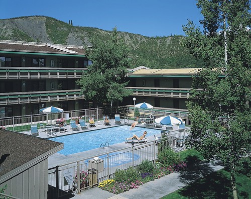 Guests at the pool at Wildwood.lodging facility pool aspen colorado summer 