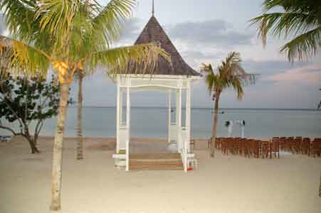 The picture below shows the beach gazebo and a wedding set up next too it
