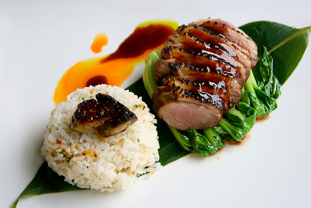 Roasted Marinated Duck Breast, Zento's Style, served with foie gras and baby bokchoy and garlic rice