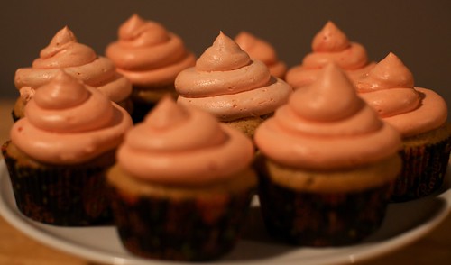 vanilla cupcakes with orange frosting