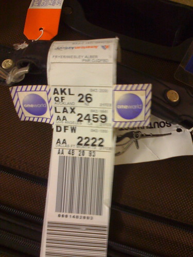 Luggage tag from OKC to AKL