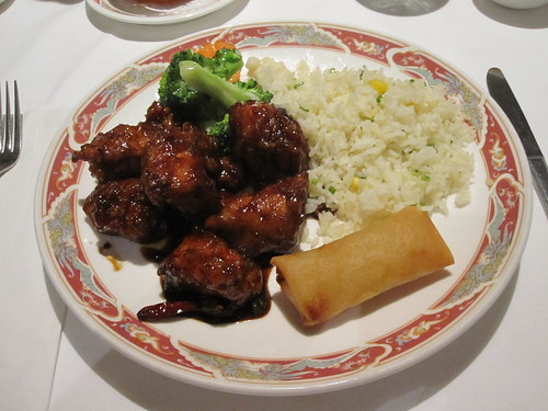 General tao chicken, spring roll, rice, veggies