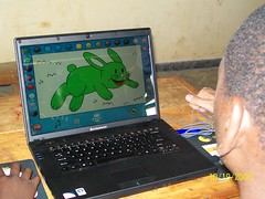 Computer lab, this student is learning to use a mouse with coloring software by Gashora Rwanda