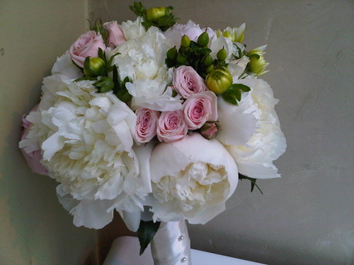 Bridal Bouquet The bridal boquet is a profusion of ivory and blush Peonies