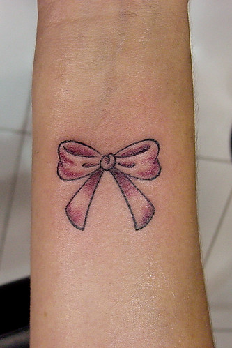 bow tattoos on wrist