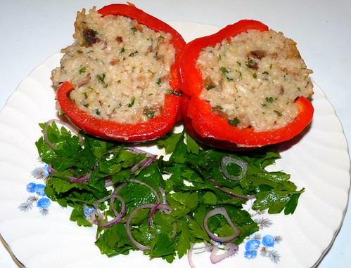 Porcini risotto stuffed capsicum with parsley & onion salad