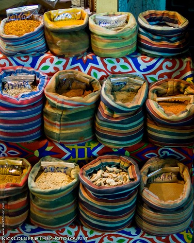 A spice shop in the Khan el-Khalili bazaar in Cairo, Egypt, displays its wares loose, in colorful cloth bags.