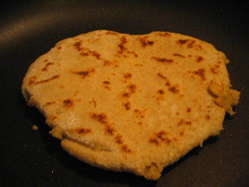 Frying up the roti