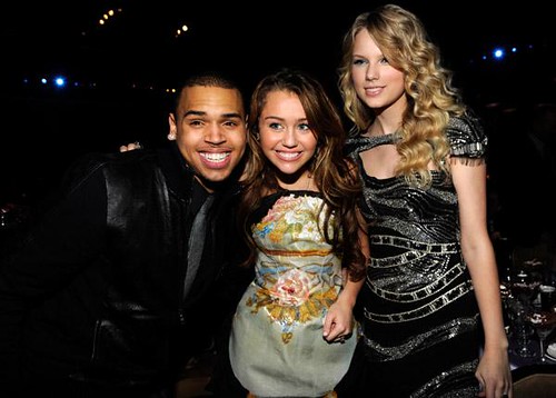 Chris Brown, Miley Cyrus and Taylor Swift at the Pre Grammys party by chiarajonas.