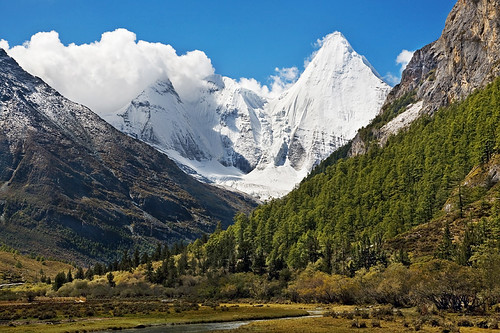 Three Sacred Mountains of Daocheng, Sichuan, by utpala