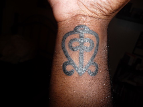 It's a West African Adinkra symbol that means “Love Never Loses Its Way Home 