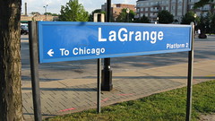 The metal platform sign on the eastbound platform at the Metra / Amtrak train station at La Grange Road. La Grange Illinois. July 2009.