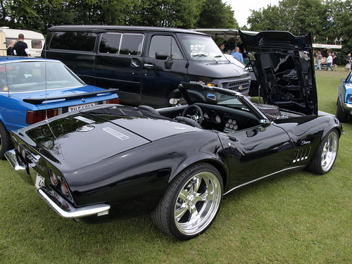 This very fine 69 Chevrolet Corvette Stingray convertible riding on 20' was