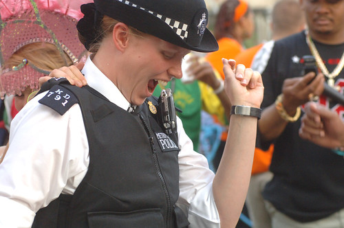 Nottinghill Carnival - Police Lady dancing