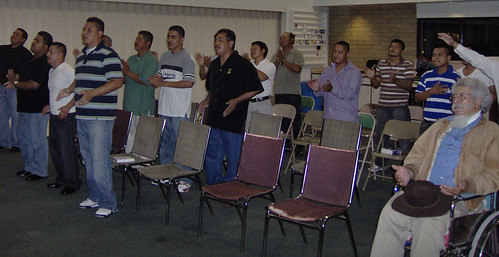 Members of the Alfa y Omega Church pray for men in the congregation who were detained. (Photo: Alfa y Omega Church)