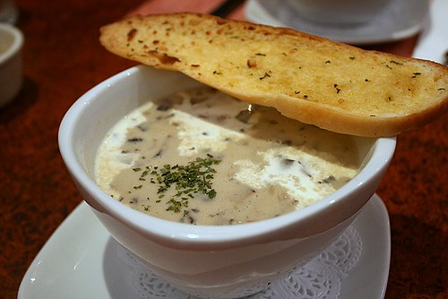 Cream of mushroom soup, with slice of bread that's seen better days