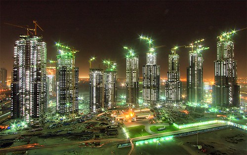 a cluster of new towers rises in Dubai (by: Mohamed Somji, creative commons license)