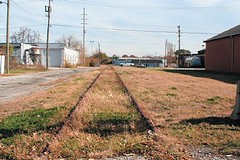 old industrial buildings and brownfields line the abandoned rail corridor (courtesy of AIA)