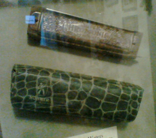 LC's harmonica and case