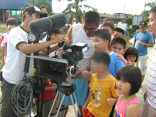 The kids checking the scenes we shot