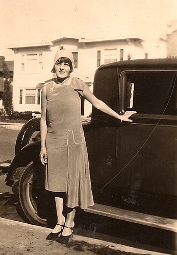 Woman with car, 1920's