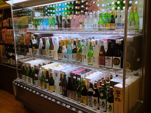 Small to large bottles of sake, chilled