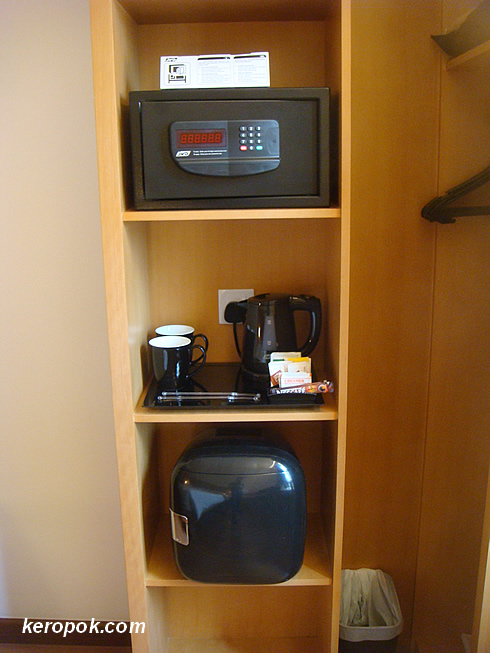 The coffee maker, fridge and safe.