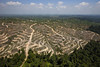 A network of tracks in a huge deforested area among pristine forest di Greenpeace International