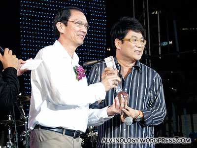 Movie director, Jack Neo receiving his award