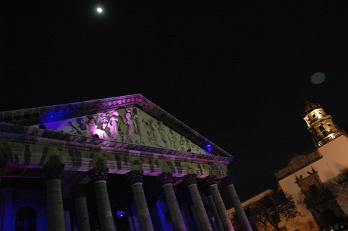 Library frieze, columns, colored light display, moon, downtown Guadalajara, Jalisco, Mexico by Wonderlane