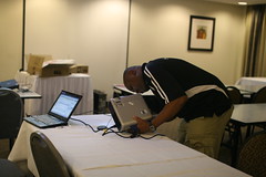Michuki Mwangi setting up a projector