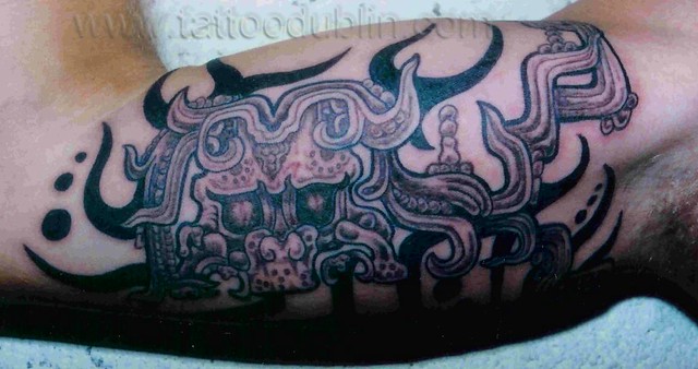 mayan style black and shade tattoo by dublin ireland tattoo artist 'Pluto'