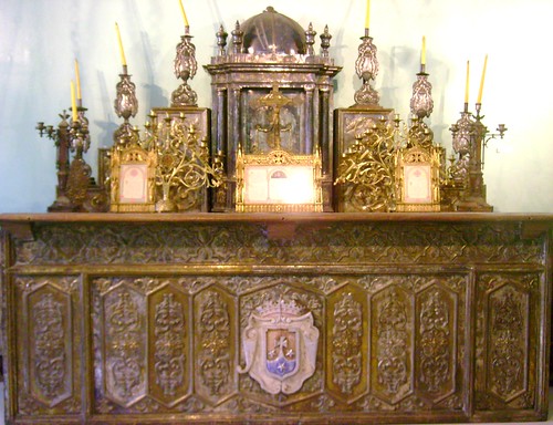 A beautiful altar with its sacristy, adored with gold and silver