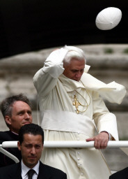 Pope looses hat