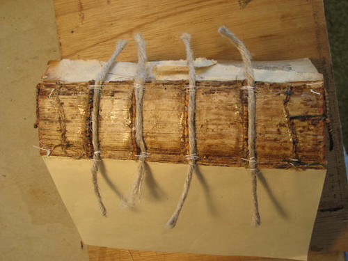 Cords sewn onto the spine 