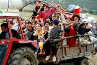 Kosovar refugees returning home