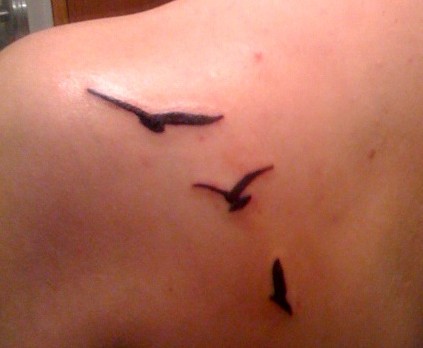 bird silhouette tattoo. ird tattoo