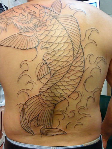 dragon koi outline tattoo done by