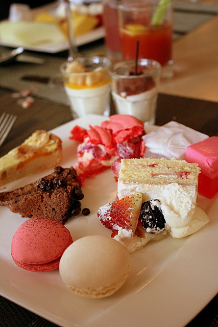 My dessert platter with macarons, strawberry shortcake, manjari chocolate cake, apricot tart, rose ispahan and Thai jellies