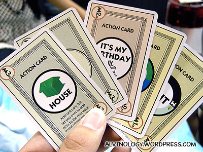 Money, property and action cards are all mixed together