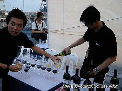 Serving wine to the VIPs and artistes