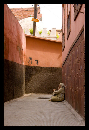 woman begging in the medina of Marrakech