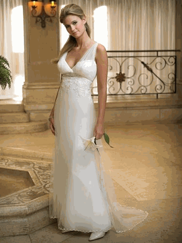 Wedding dress decorated with a big strap on shoulder