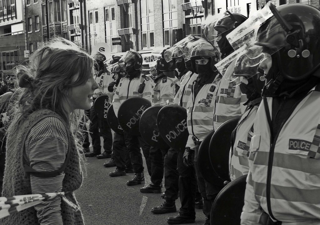British riot police confront 'dangerous' protestor