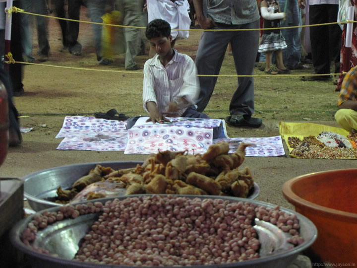 thrissur pooram - Street vendor near the Pooram exhibition