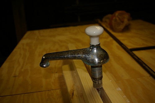 1920s Standard faucet with porcelain drain plug