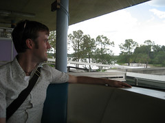 ian in the front of the tram on his way to disneyworld