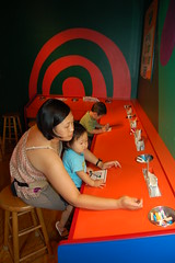 Aki doing Color magic drawing with mama
