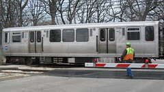 Northbound CTA Purple line train at the Isabella Street railroad crossing. Wilmette Illinois. Early March 2009.